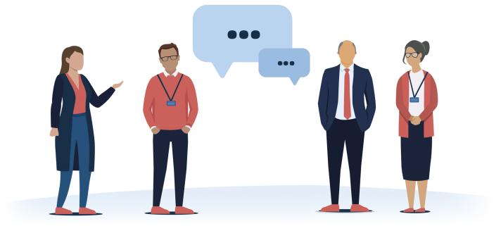Illustrative figures standing with a speech bubble to show communication 